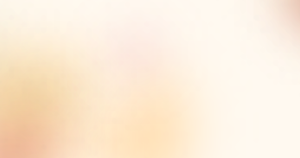 Warm, softly blurred background featuring gentle shades of cream, peach, and pale yellow with subtle pink and orange tones creating a sunlit, dreamy effect.