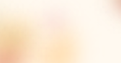 Warm, softly blurred background featuring gentle shades of cream, peach, and pale yellow with subtle pink and orange tones creating a sunlit, dreamy effect.